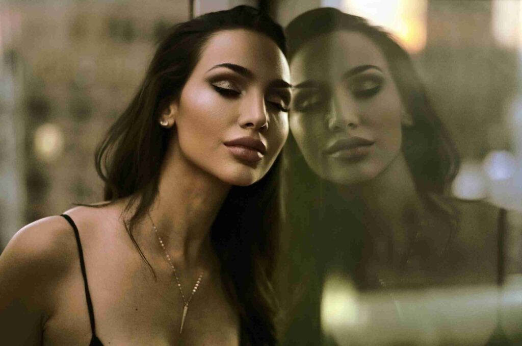 A woman in sportswear is playfully splashing water, featured on the cover of  DAVID'S GUIDE  magazine.