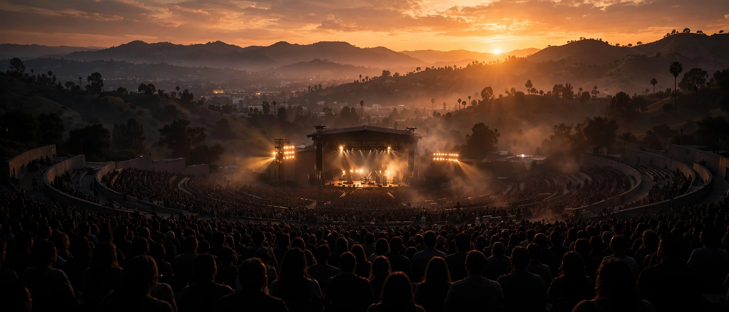 Crowd at an outdoor Los Angeles concert at sunset, photographed by David's Guide.