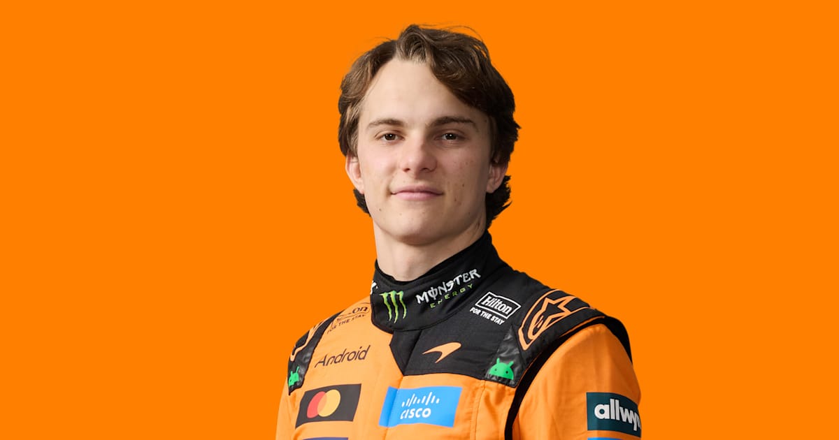 Oscar Piastri in his official 2026 McLaren driver portrait; his second place at Suzuka was McLaren's first podium of 2026.
