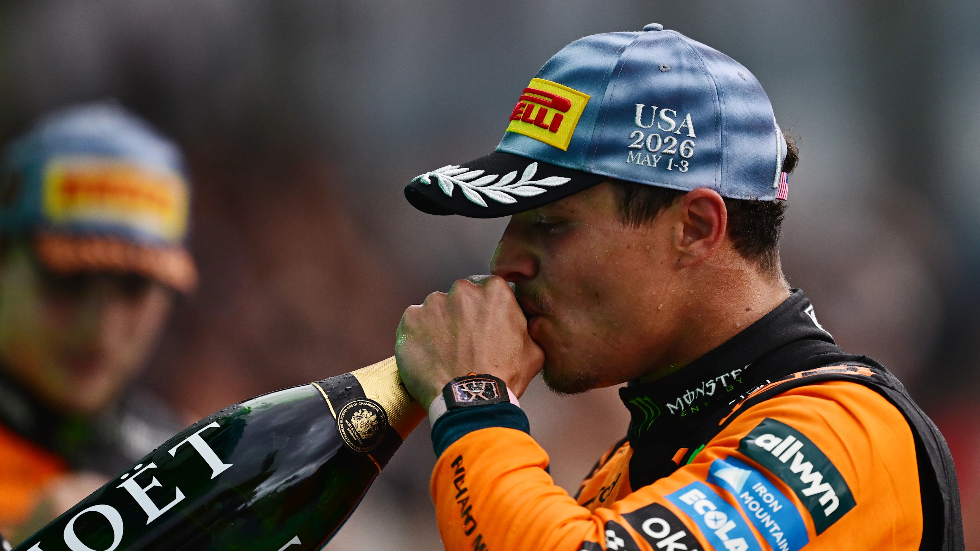 Lando Norris of McLaren celebrates on the Miami podium after delivering the team's first sprint victory of the 2026 season.