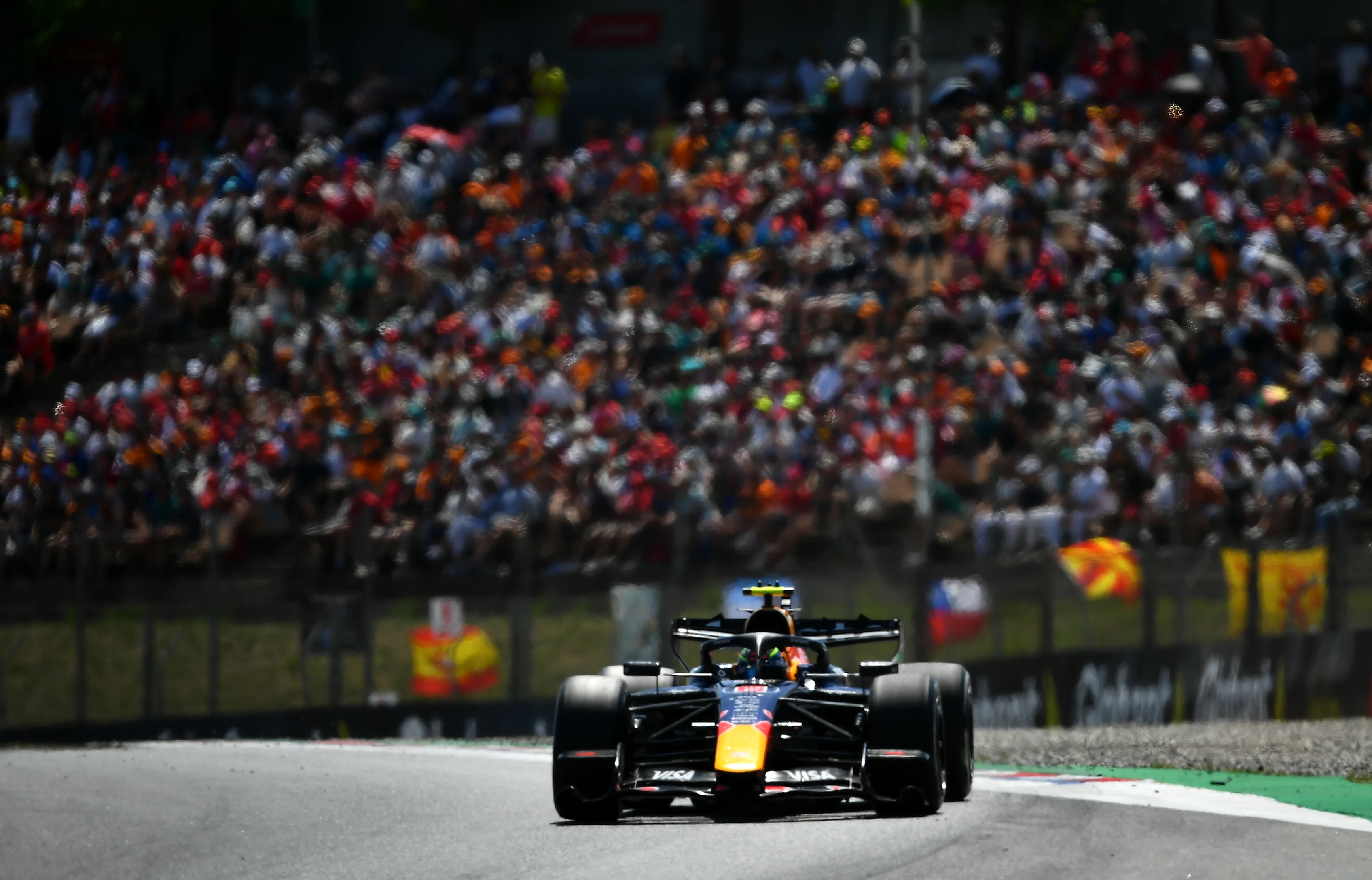 Isack Hadjar drives the Oracle Red Bull Racing car at Barcelona, where he finished sixth behind teammate Max Verstappen