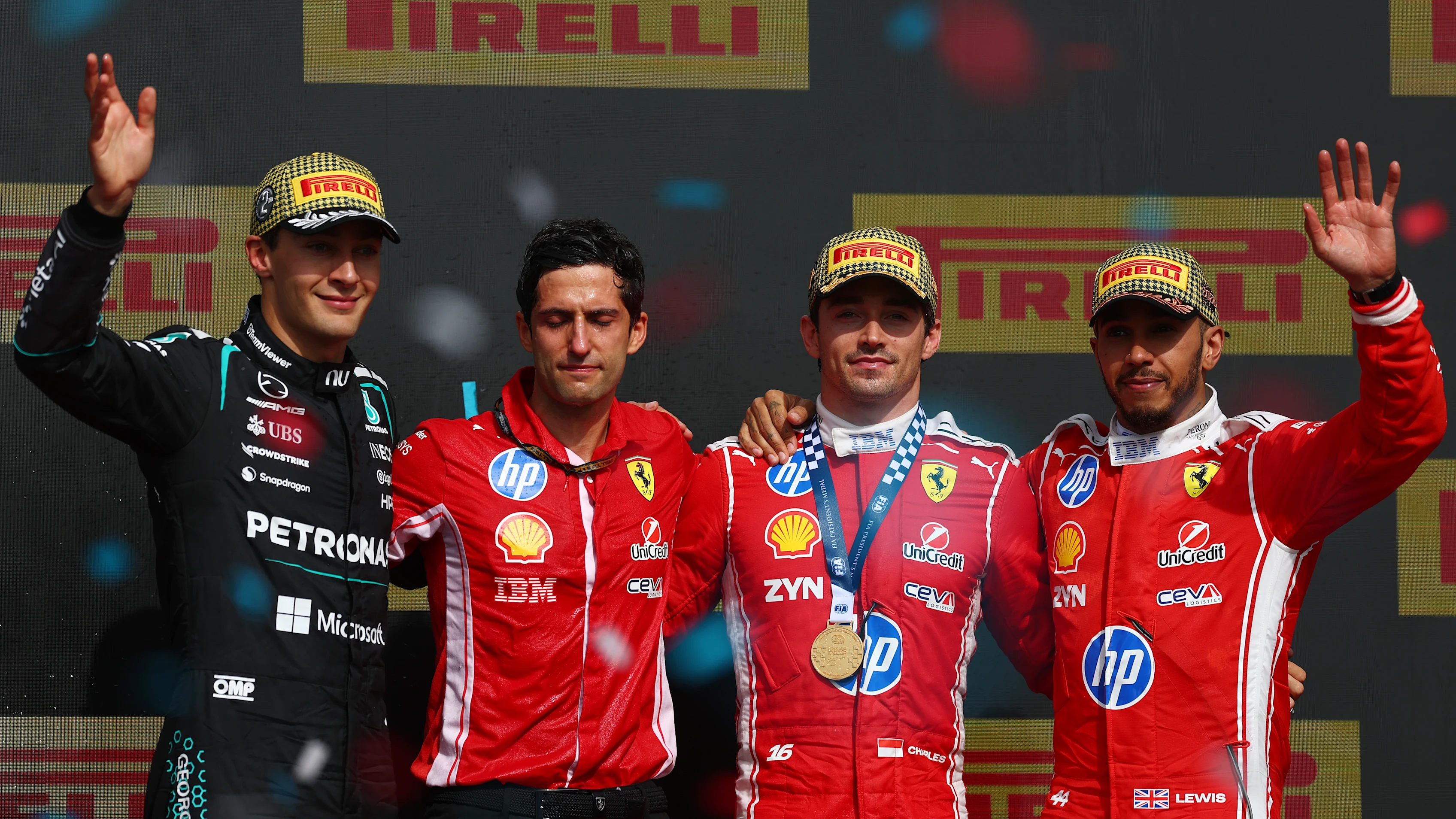 Race winner Charles Leclerc of Scuderia Ferrari celebrates after winning the British Grand Prix at Silverstone.