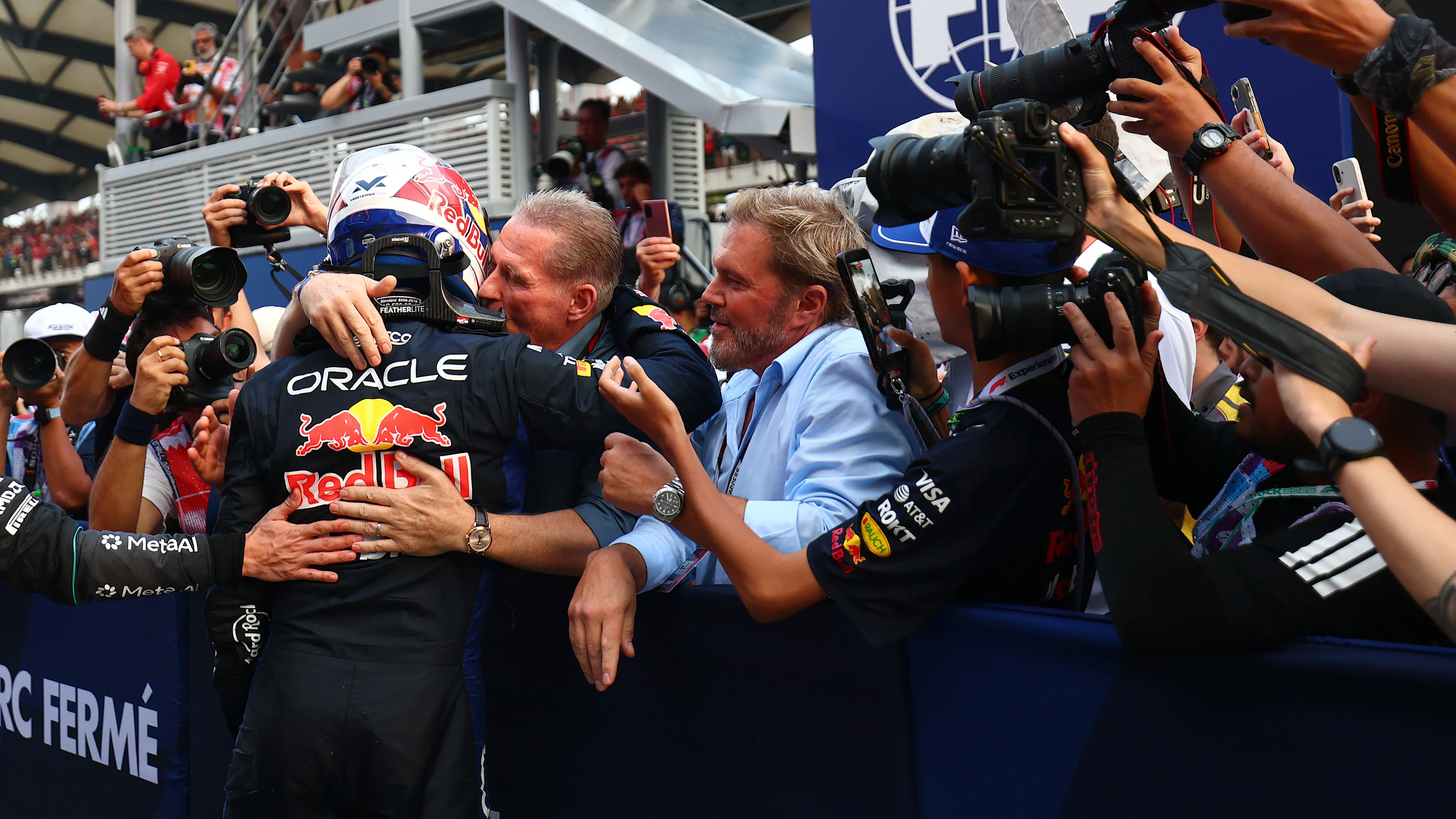 Race winner Max Verstappen of Oracle Red Bull Racing celebrates with the team in parc ferme after the Bahrain Grand Prix in Malaysia.