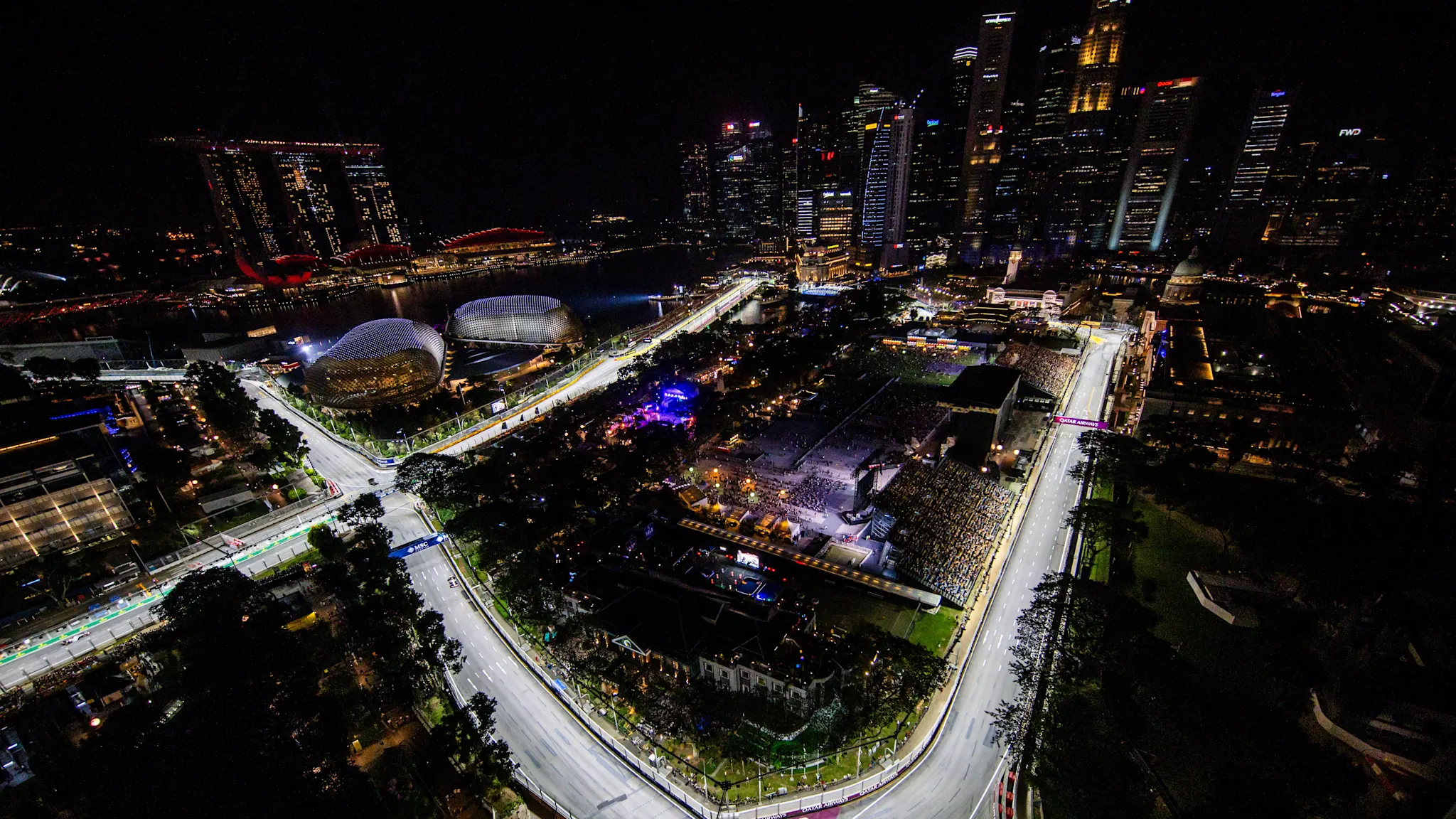 Marina Bay Street Circuit glowing under floodlights at night.