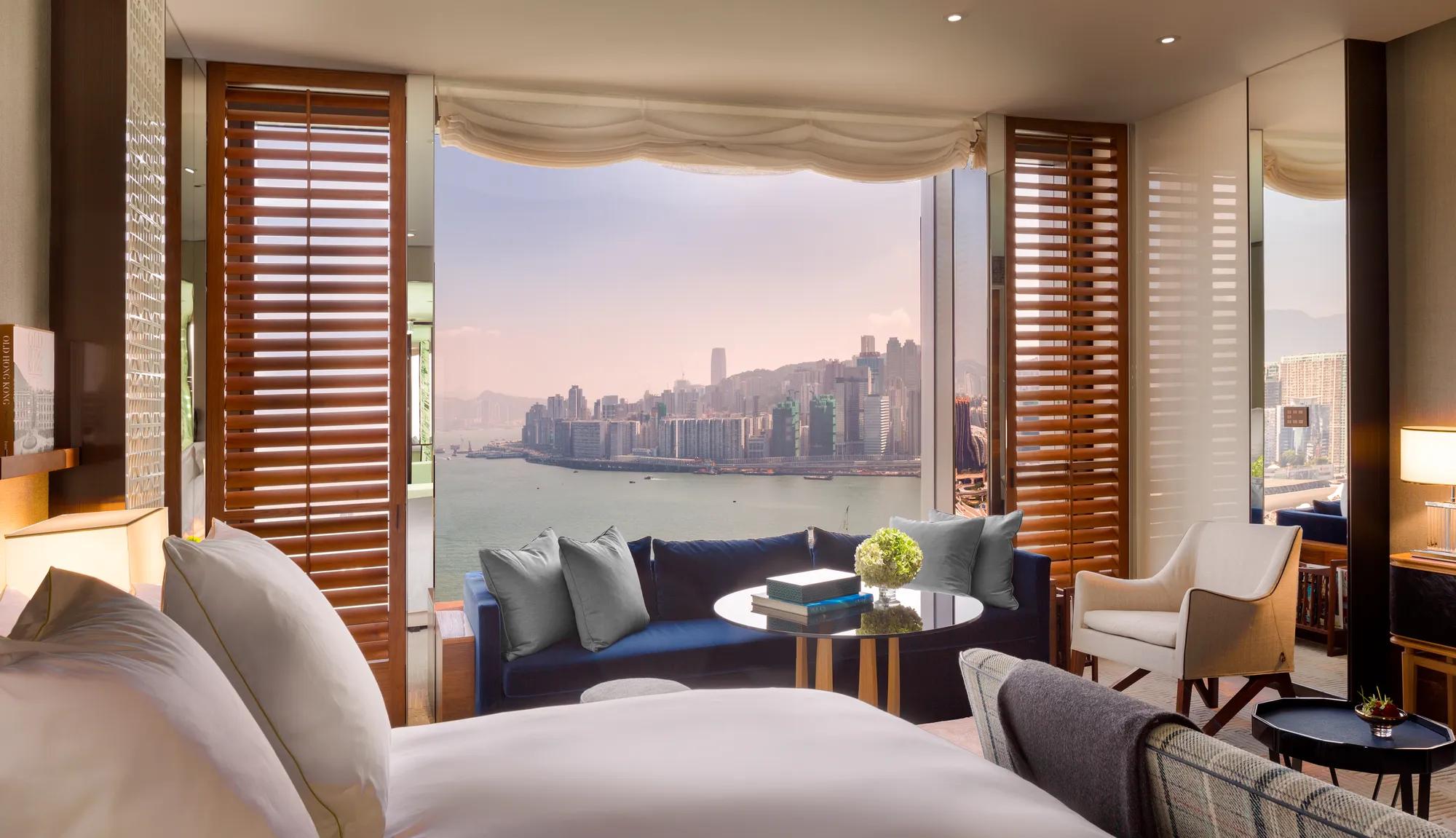 Harbour View Room at Rosewood Hong Kong with floor-to-ceiling windows overlooking Victoria Harbour
