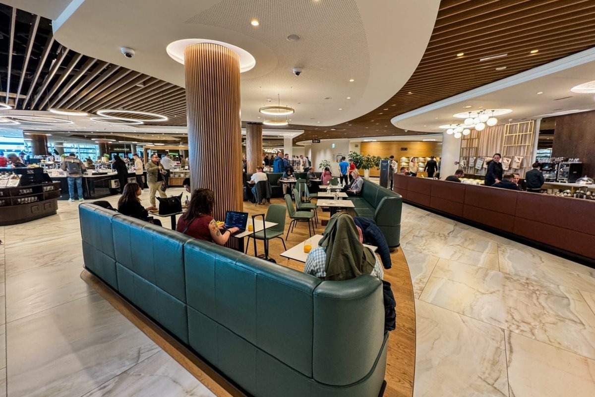 Luxury hotel lobby with marble floors and elegant check-in desk