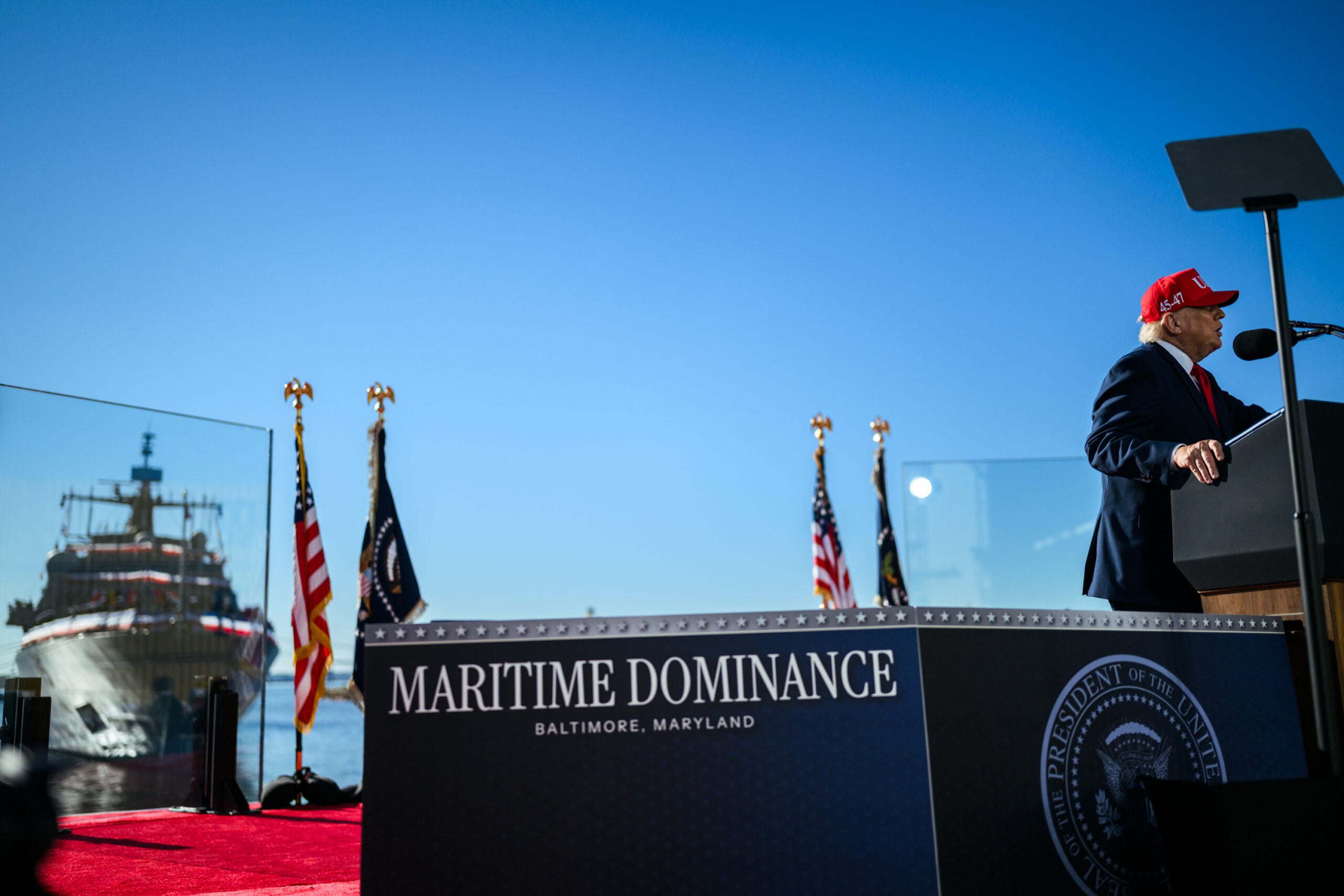 President Trump speaking at a podium at the Anduril Arsenal-2 announcement in Baltimore