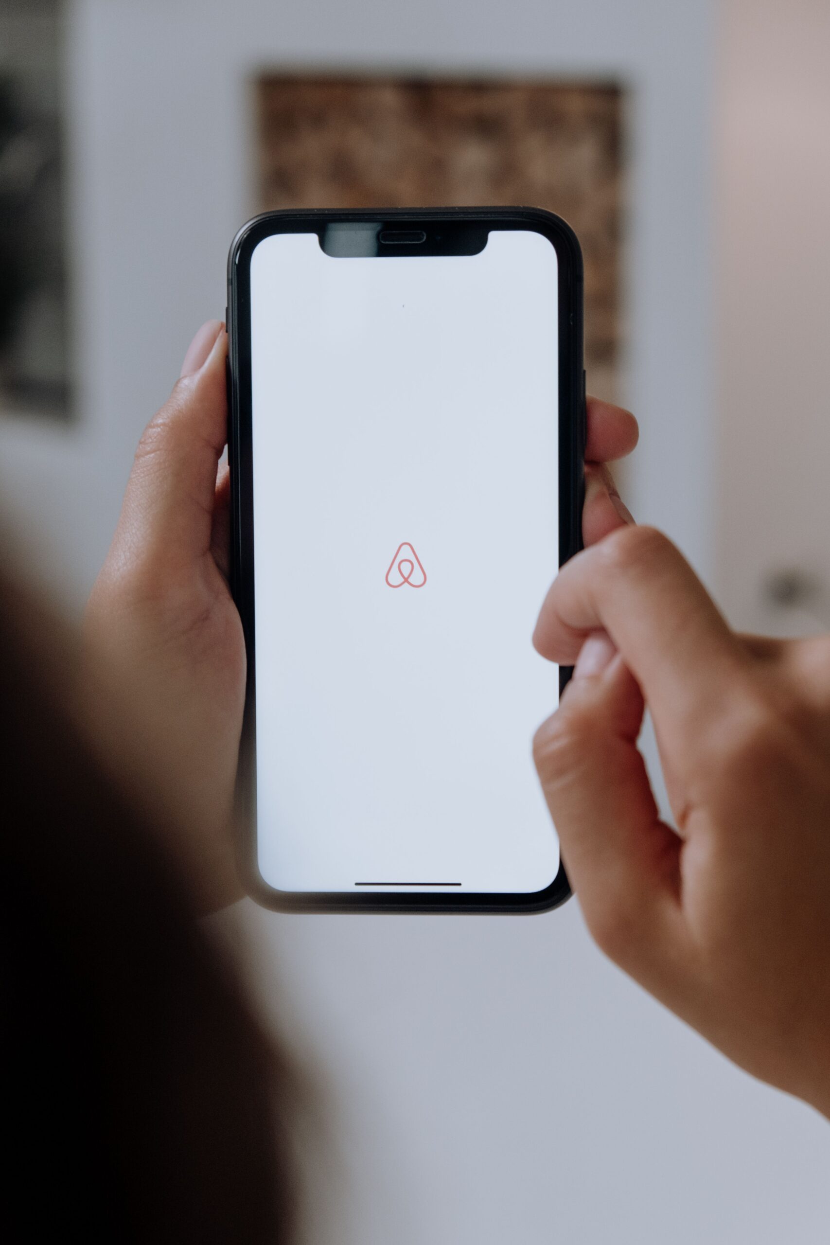 Hotel award booking on a phone screen, the kind of redemption affected by hotel points devaluation in 2026.