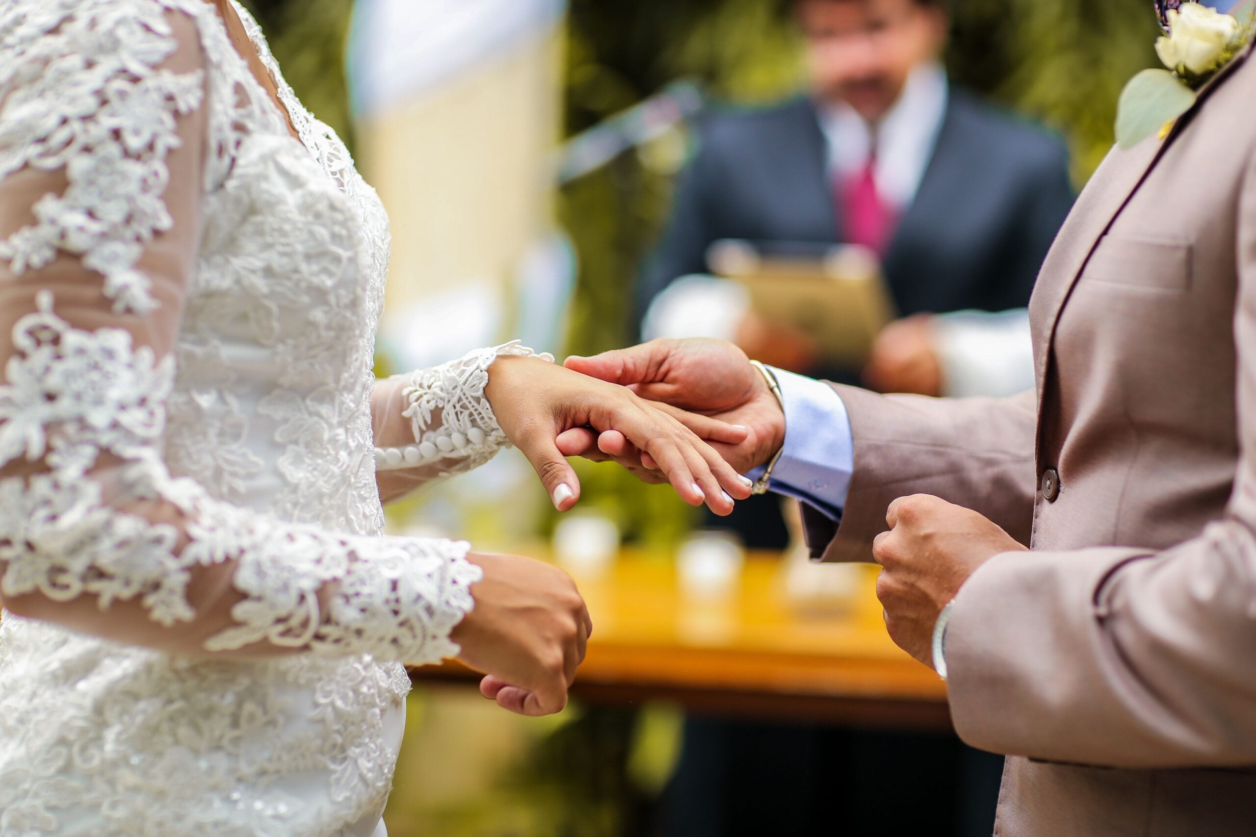 Couple exchanging vows during an intimate outdoor elopement ceremony