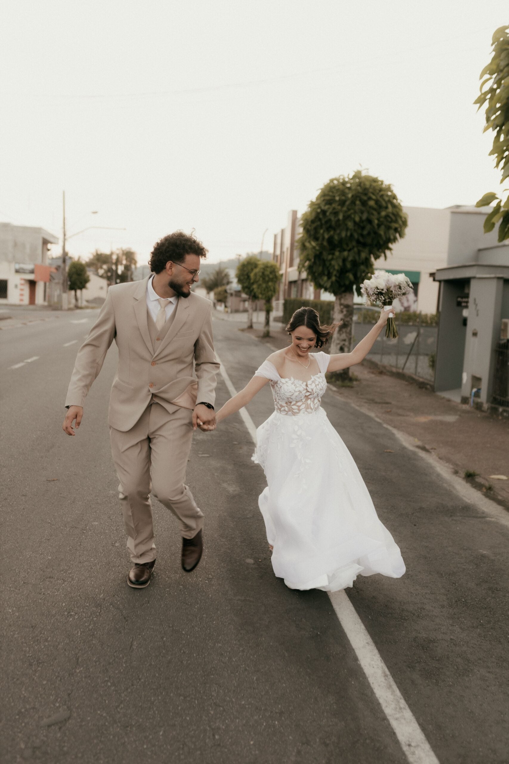 Newly married couple walking together in downtown Los Angeles