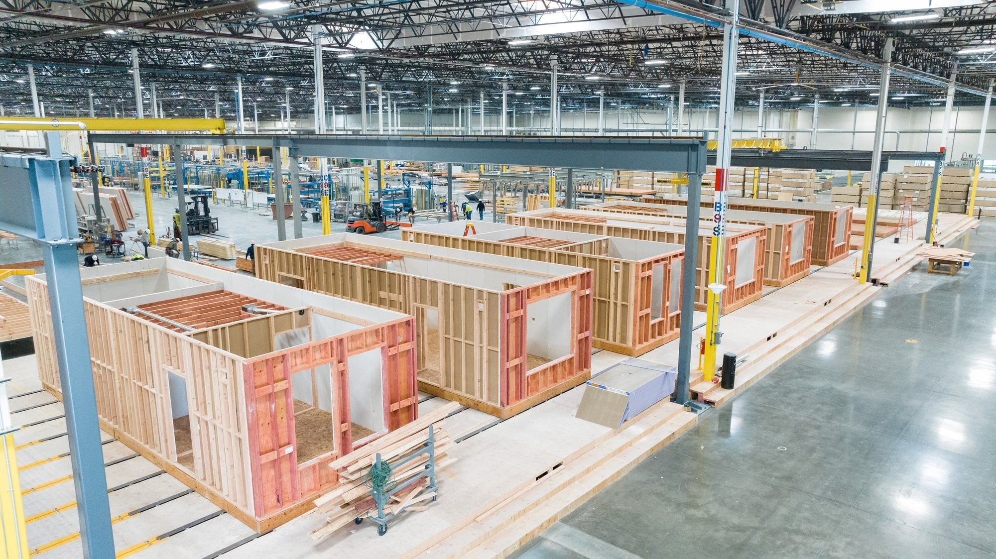 Modular homes under construction on a factory production line