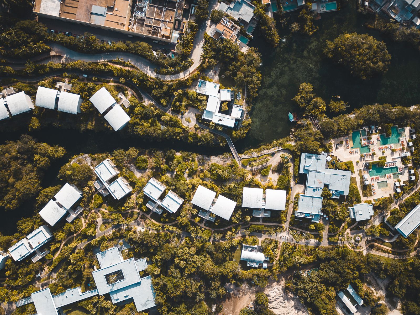 Aerial drone view of luxury Los Angeles homes and landscaping
