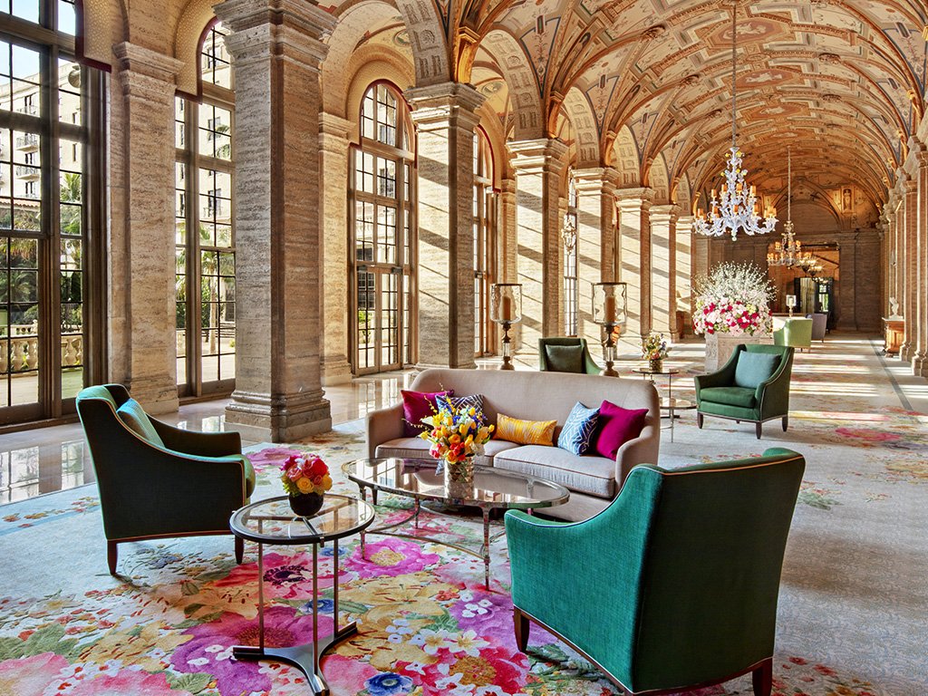 The 200-foot main lobby at The Breakers Palm Beach with its hand-painted ceiling and Venetian chandeliers