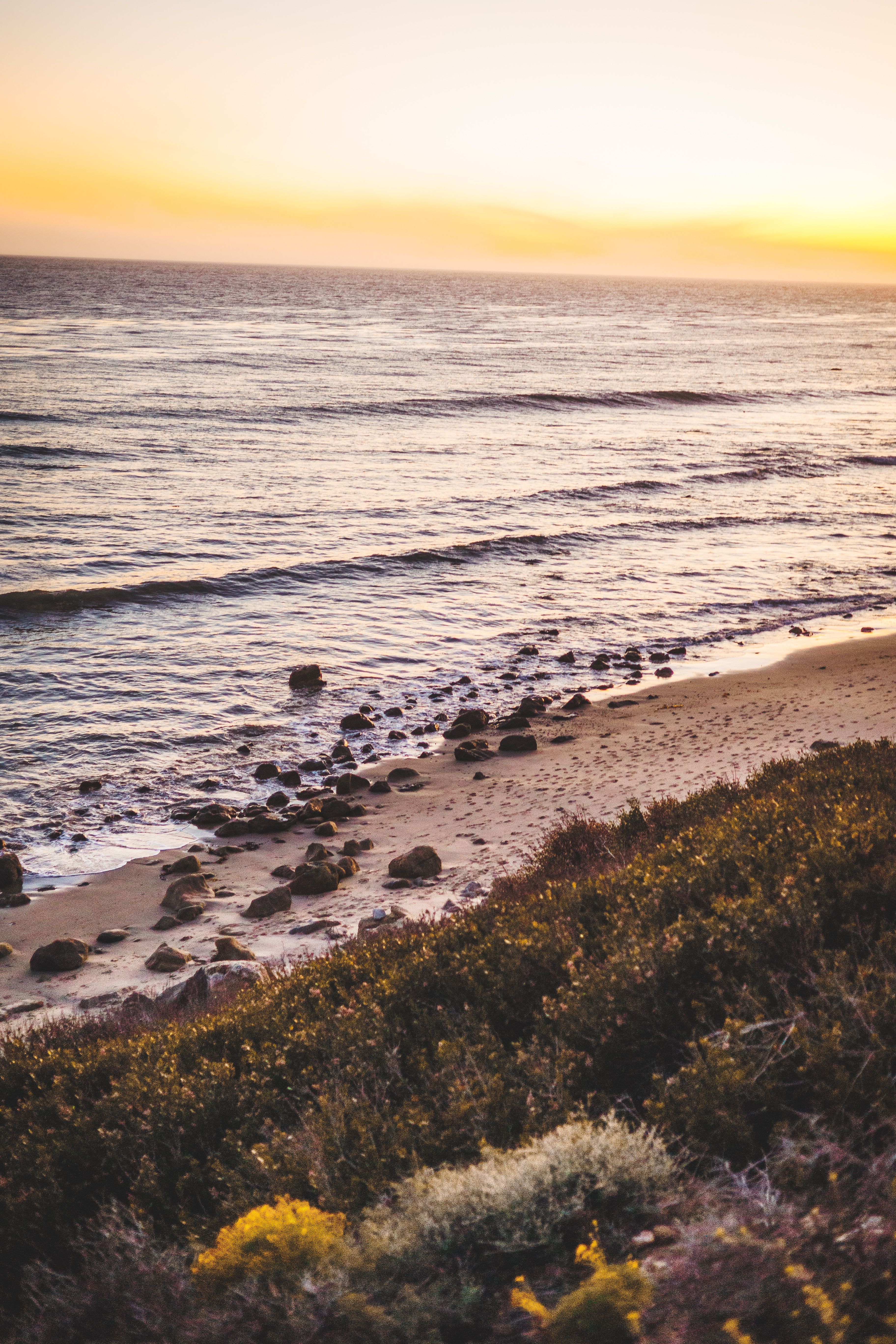 Waves and sunset along the Malibu coastline in California