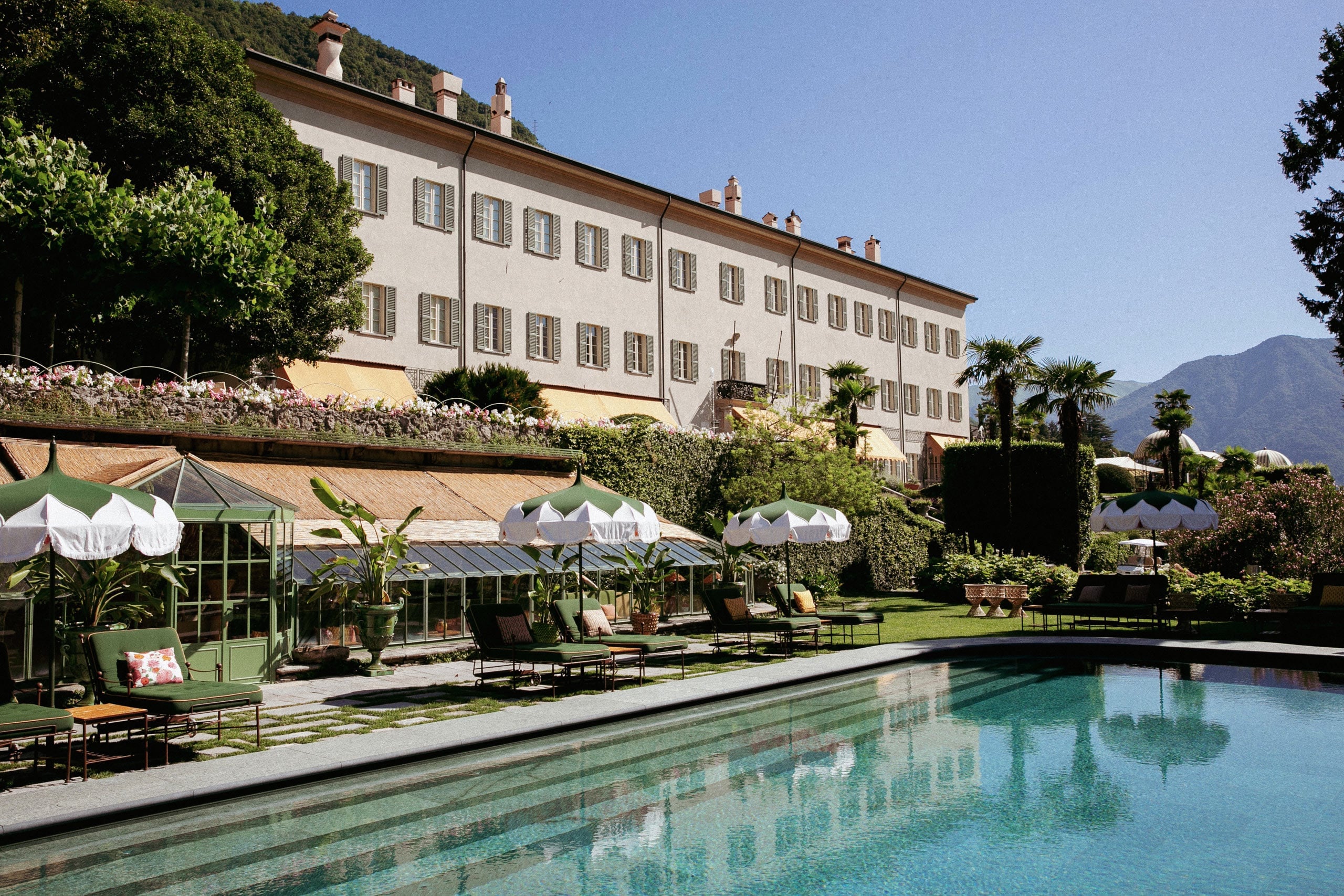 Passalacqua villa facade above its terraced gardens and lake-view pool at Moltrasio, Lake Como