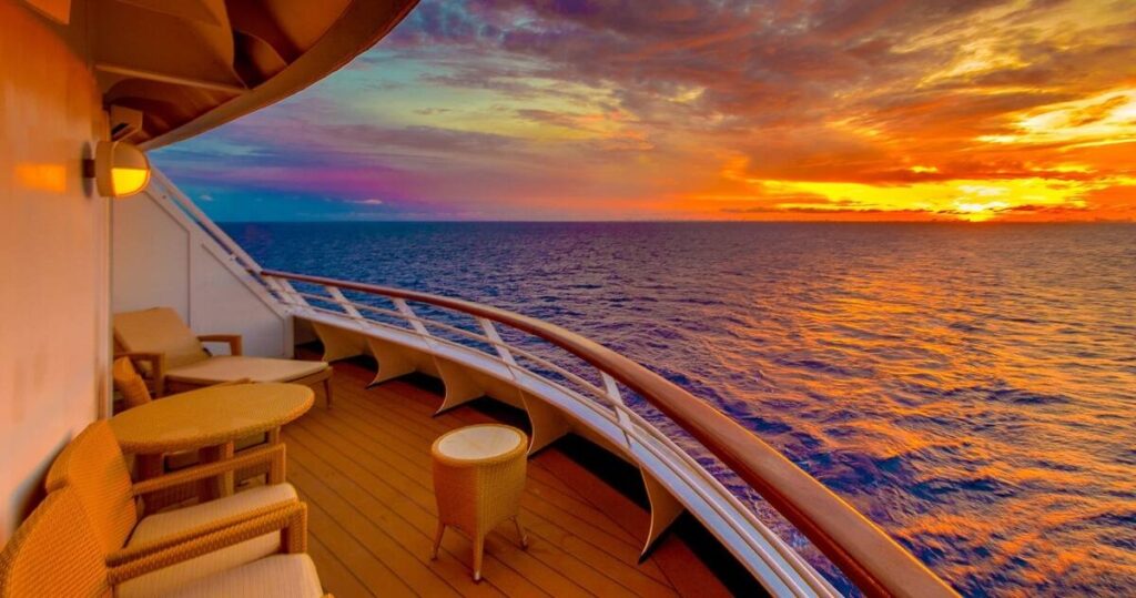 Sunset over the ocean viewed from a cruise ship deck