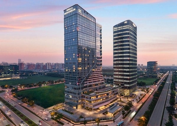 Shilla Monogram Hanoi Westlake tower at dusk, the 35-storey Starlake building with Shilla Monogram signage