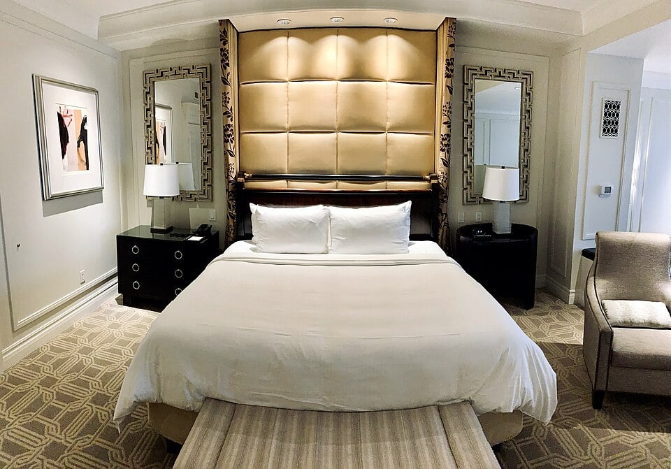King bed inside a spacious luxury hotel suite at The Palazzo in Las Vegas