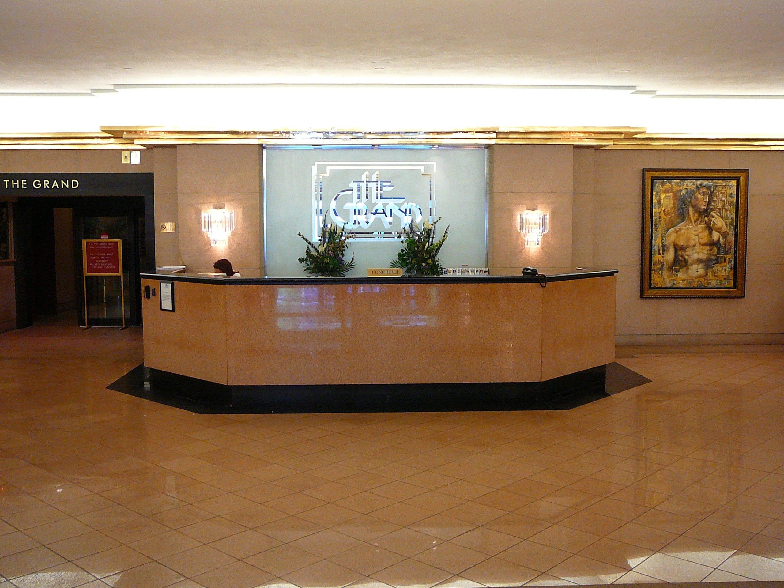 Marble concierge desk in the lobby of The Grand Doubletree hotel