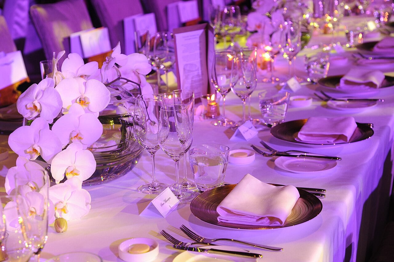 Elegant fine dining table setting with wine glasses in a luxury hotel restaurant